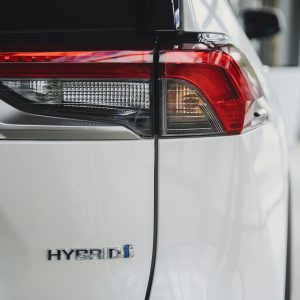 Elegant close-up of a hybrid car tail light showcasing modern automotive design.